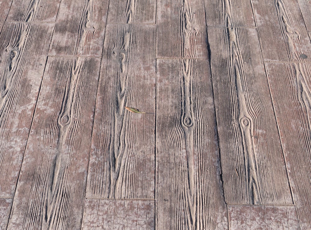 Wood effect imprinted concrete driveway Photo showing a wood effect imprinted concrete driveway in croydon